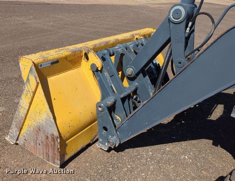 image for item LY9442 2014 John Deere 210K  landscape tractor