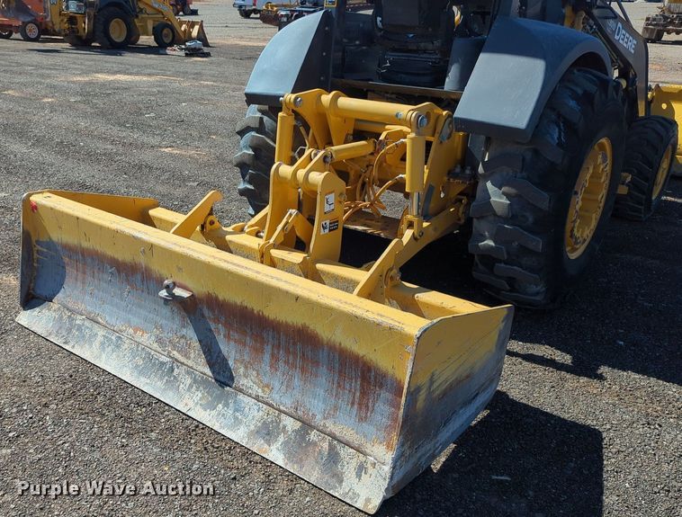 image for item LY9442 2014 John Deere 210K  landscape tractor