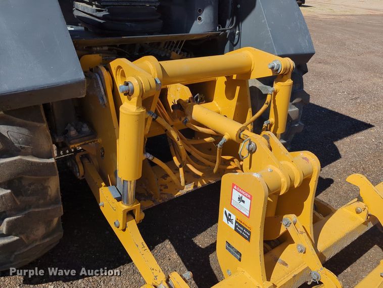 image for item LY9442 2014 John Deere 210K  landscape tractor