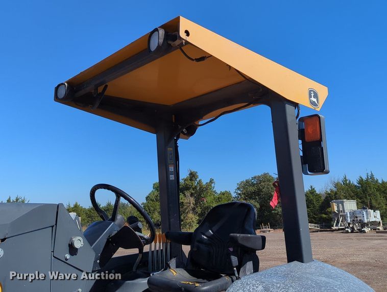 image for item LY9442 2014 John Deere 210K  landscape tractor