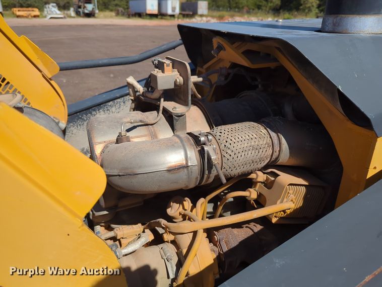 image for item LY9442 2014 John Deere 210K  landscape tractor