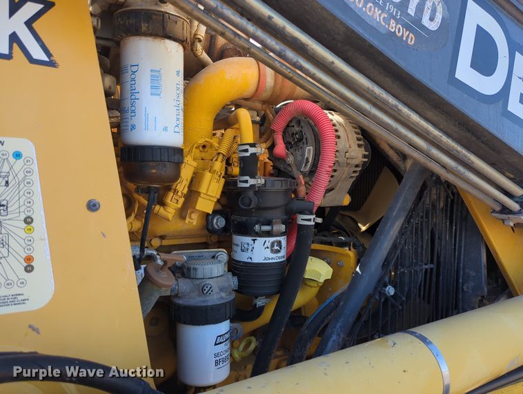 image for item LY9442 2014 John Deere 210K  landscape tractor