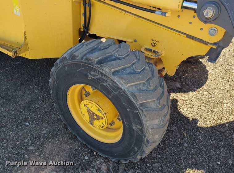 image for item LY9442 2014 John Deere 210K  landscape tractor