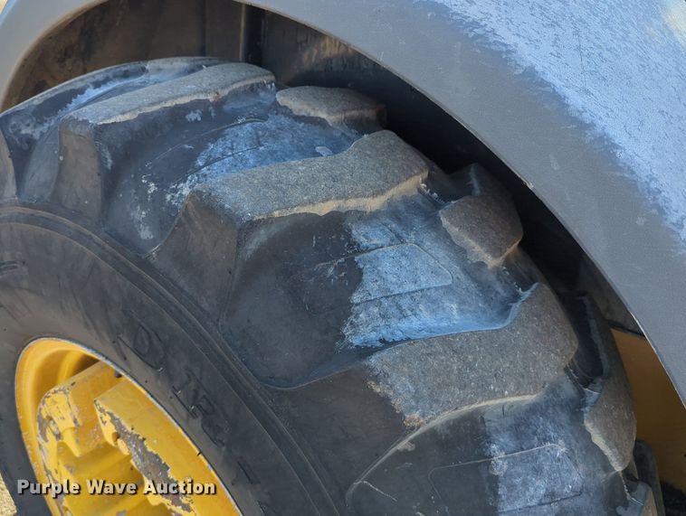 image for item LY9442 2014 John Deere 210K  landscape tractor