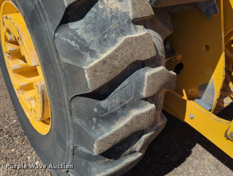 image for item LY9442 2014 John Deere 210K  landscape tractor