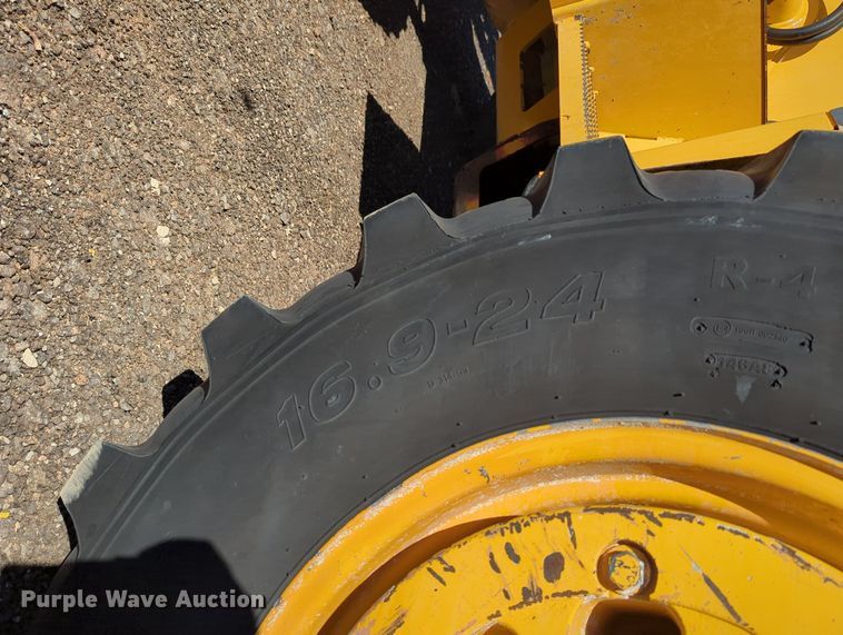 image for item LY9442 2014 John Deere 210K  landscape tractor