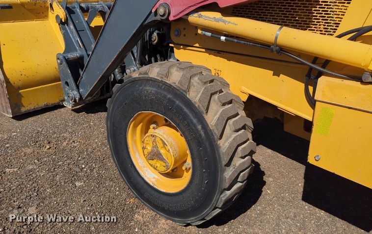 image for item LY9442 2014 John Deere 210K  landscape tractor