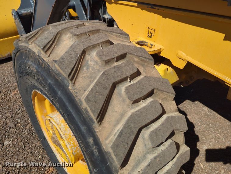 image for item LY9442 2014 John Deere 210K  landscape tractor