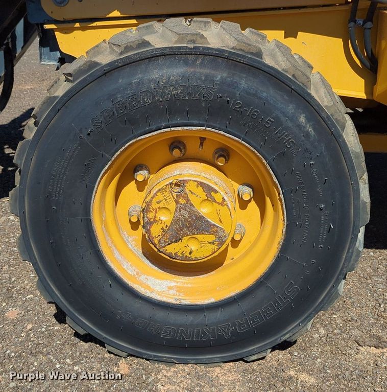 image for item LY9442 2014 John Deere 210K  landscape tractor