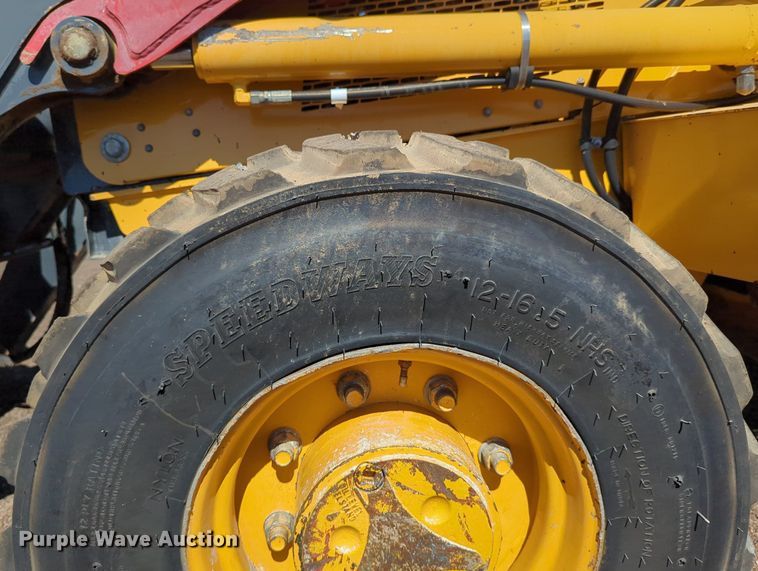 image for item LY9442 2014 John Deere 210K  landscape tractor