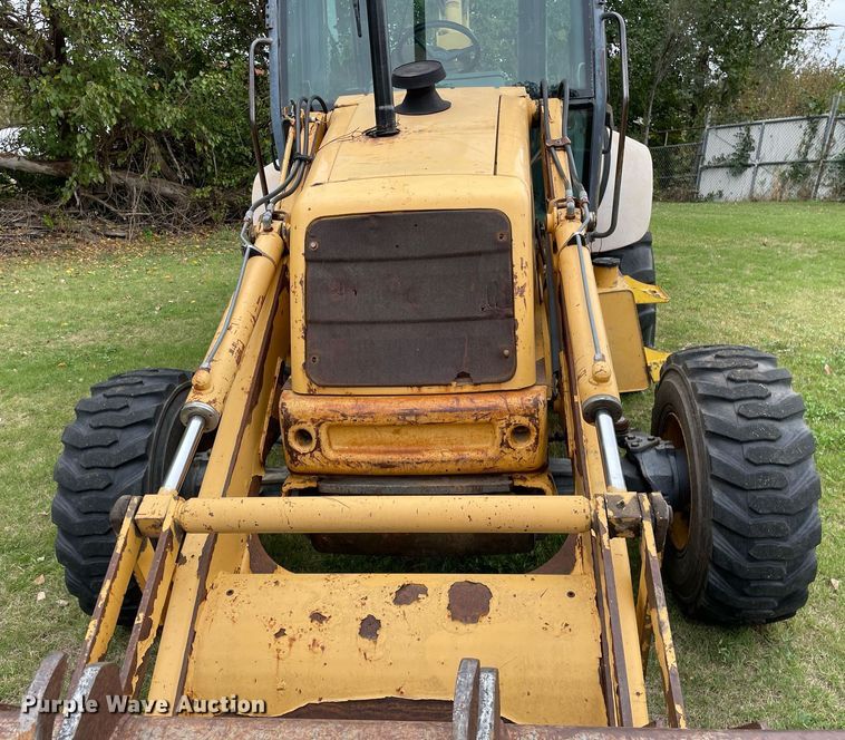 image for item NX9898 New Holland 555E  backhoe