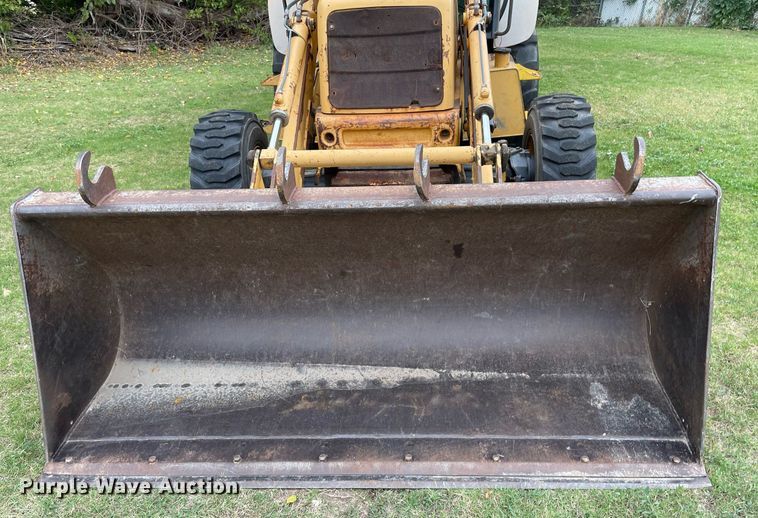 image for item NX9898 New Holland 555E  backhoe