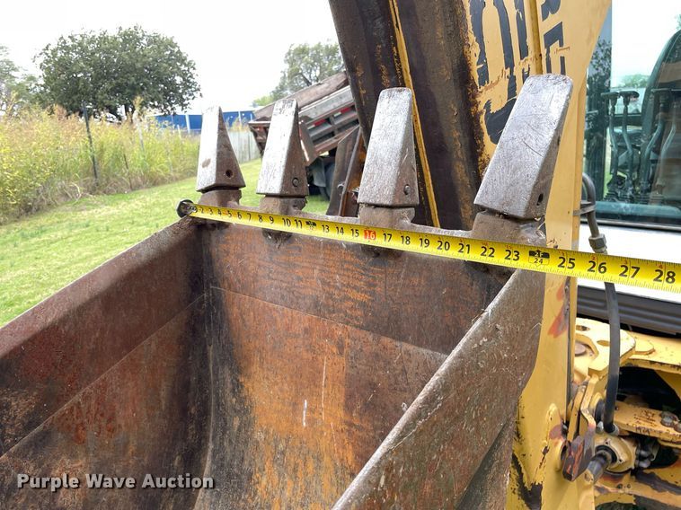 image for item NX9898 New Holland 555E  backhoe