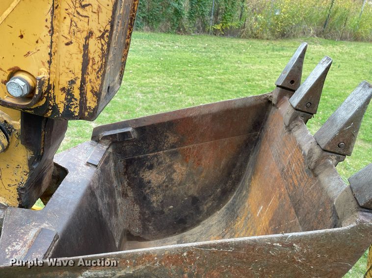 image for item NX9898 New Holland 555E  backhoe