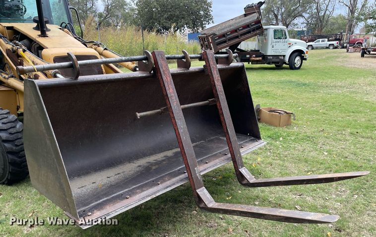 image for item NX9898 New Holland 555E  backhoe