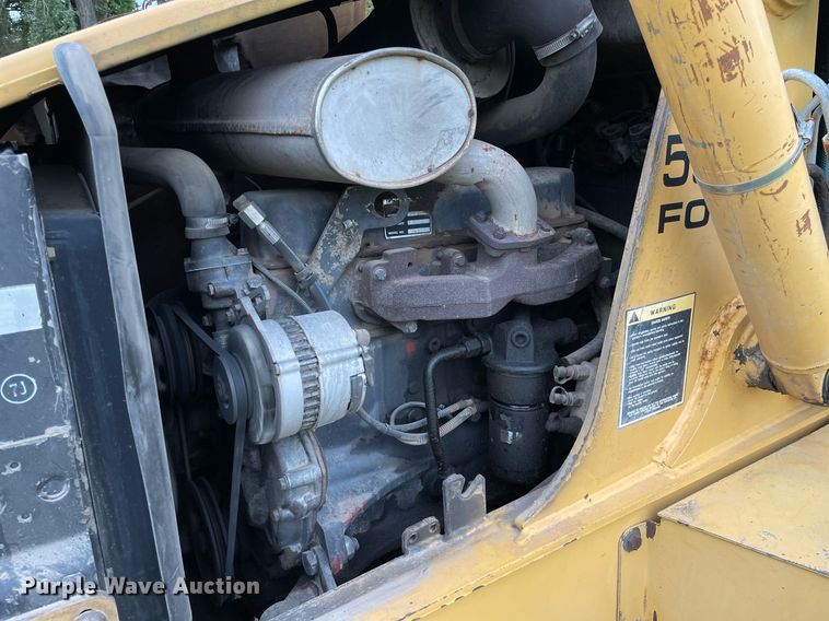 image for item NX9898 New Holland 555E  backhoe