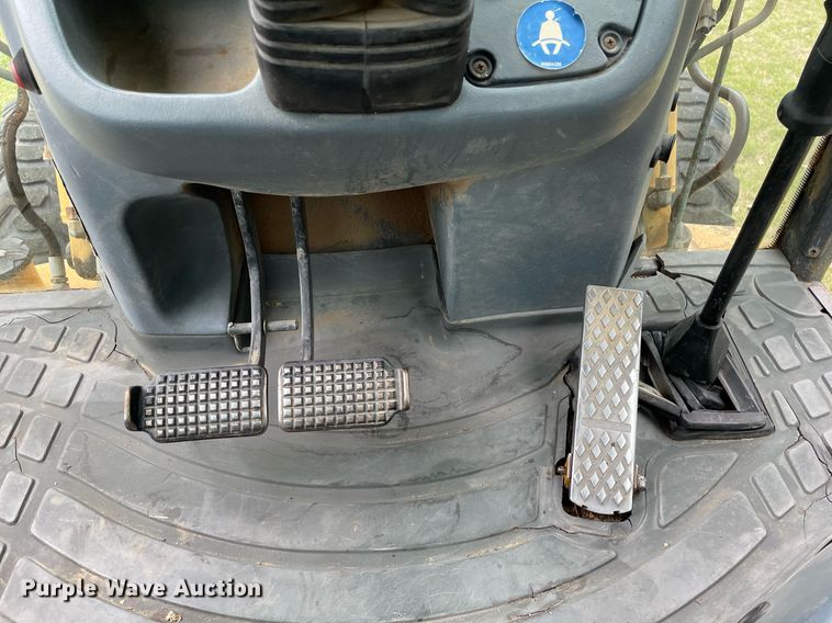 image for item NX9898 New Holland 555E  backhoe