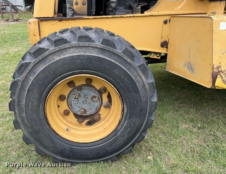 image for item NX9898 New Holland 555E  backhoe