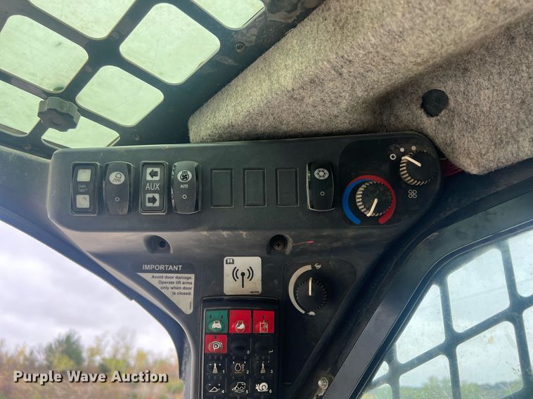 image for item OA9006 2014 John Deere 323E tracked skid steer loader