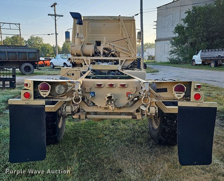 image for item DQ0334 1999 Stewart & Stevenson M 1079  truck cab and chassis