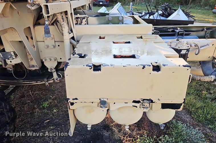 image for item DQ0334 1999 Stewart & Stevenson M 1079  truck cab and chassis