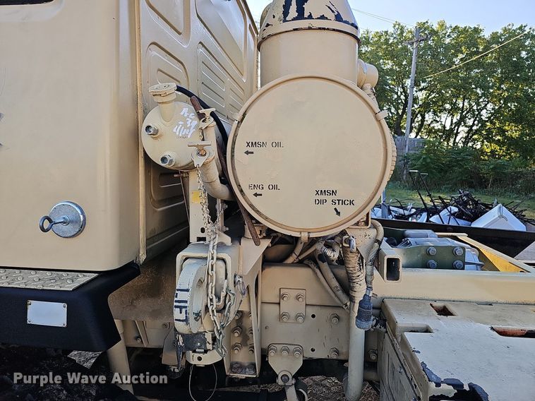 image for item DQ0334 1999 Stewart & Stevenson M 1079  truck cab and chassis