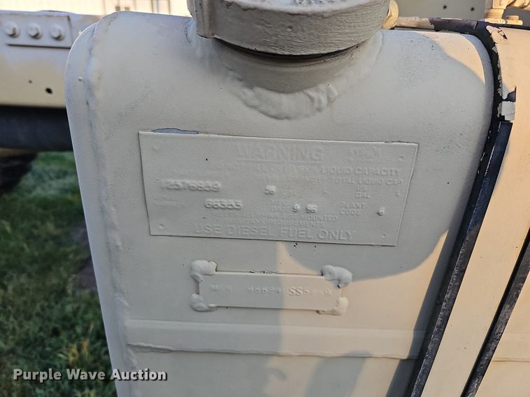 image for item DQ0334 1999 Stewart & Stevenson M 1079  truck cab and chassis