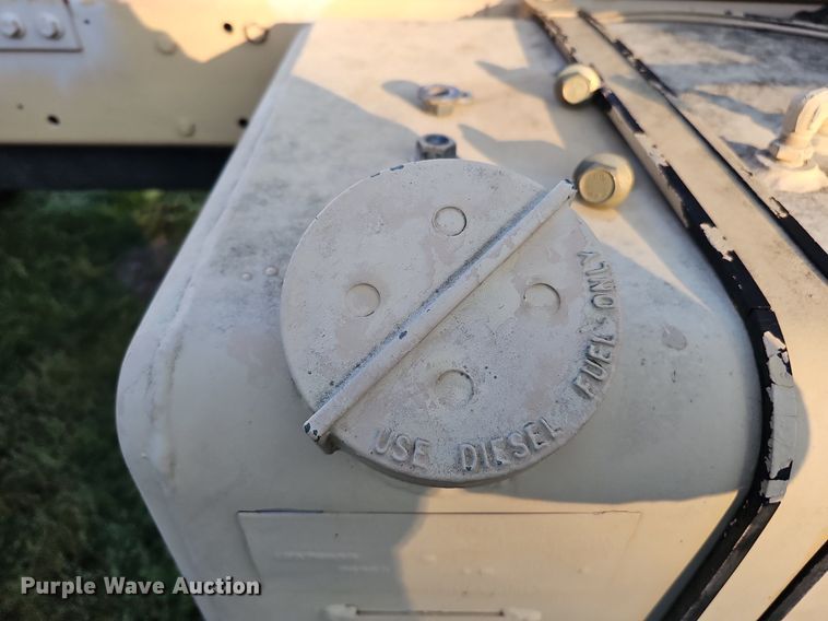 image for item DQ0334 1999 Stewart & Stevenson M 1079  truck cab and chassis