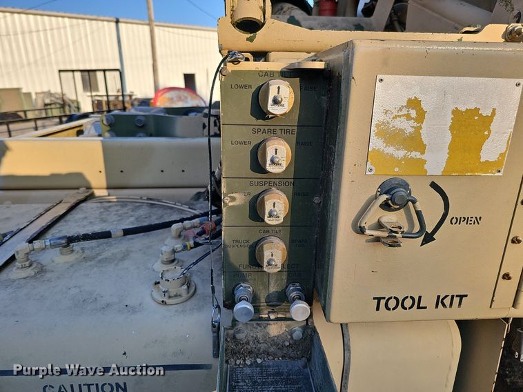 image for item DQ0334 1999 Stewart & Stevenson M 1079  truck cab and chassis