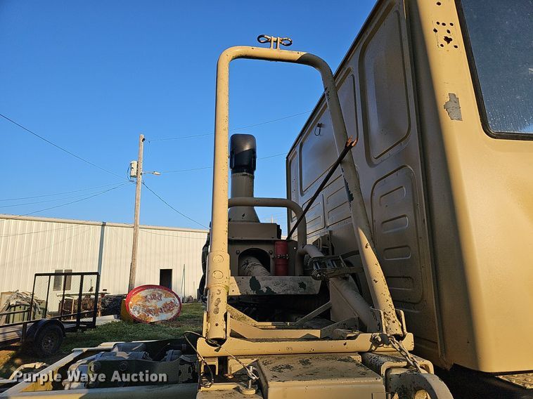 image for item DQ0334 1999 Stewart & Stevenson M 1079  truck cab and chassis