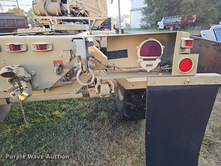 image for item DQ0334 1999 Stewart & Stevenson M 1079  truck cab and chassis