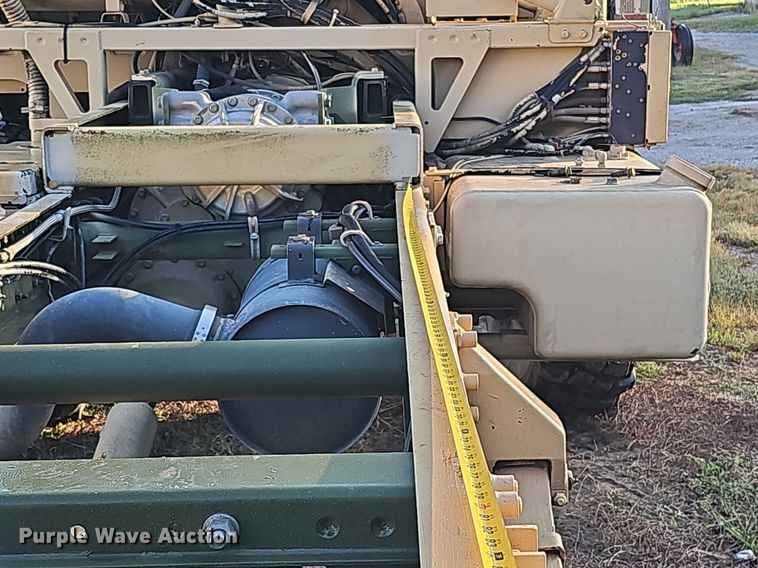 image for item DQ0334 1999 Stewart & Stevenson M 1079  truck cab and chassis