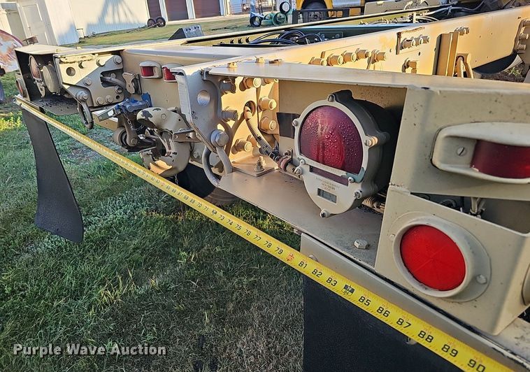 image for item DQ0334 1999 Stewart & Stevenson M 1079  truck cab and chassis