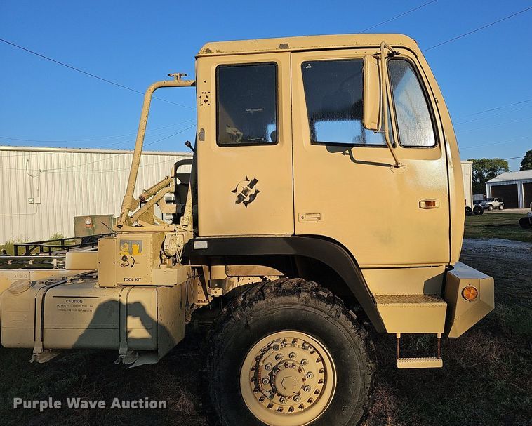 image for item DQ0334 1999 Stewart & Stevenson M 1079  truck cab and chassis