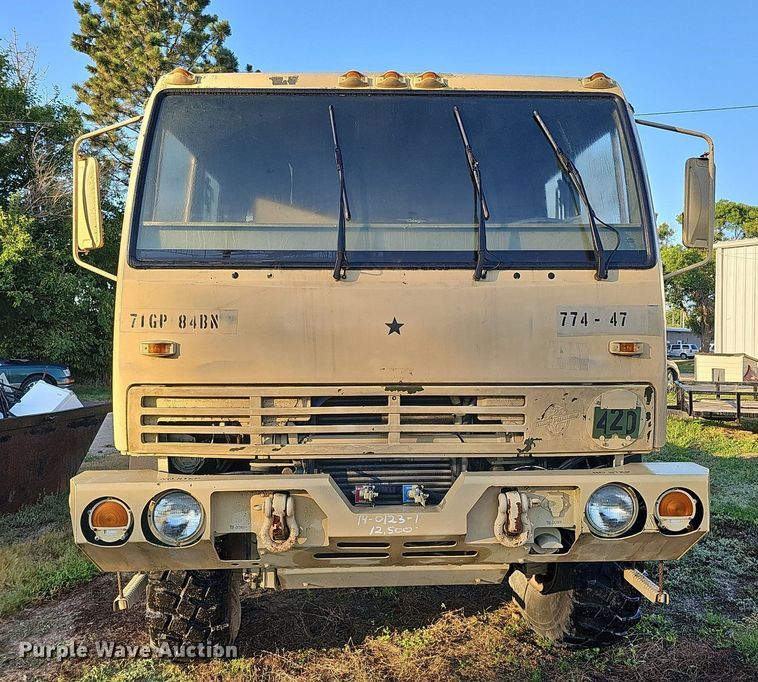 image for item DQ0334 1999 Stewart & Stevenson M 1079  truck cab and chassis