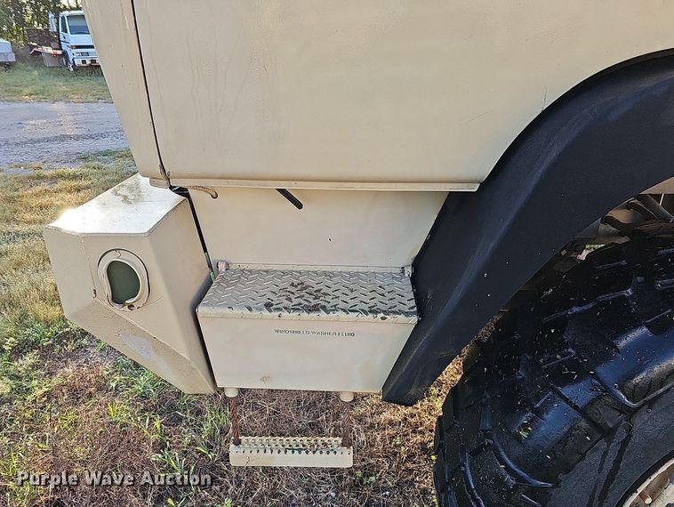 image for item DQ0334 1999 Stewart & Stevenson M 1079  truck cab and chassis