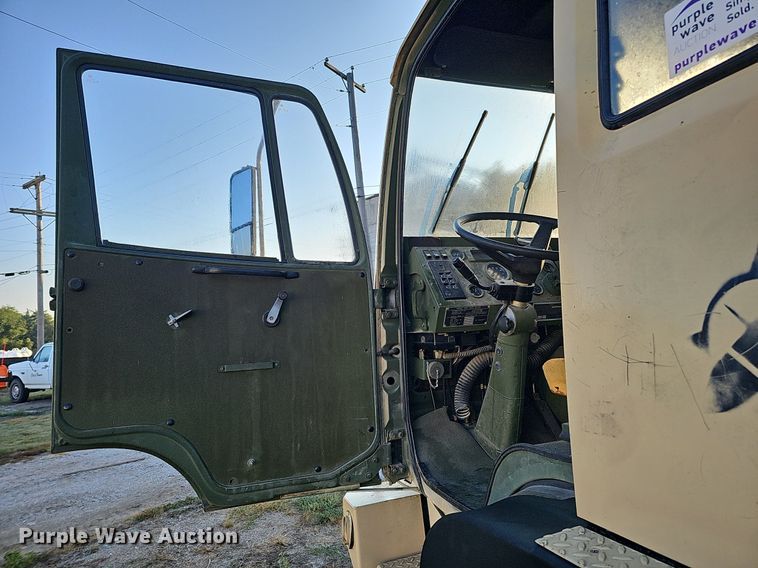 image for item DQ0334 1999 Stewart & Stevenson M 1079  truck cab and chassis