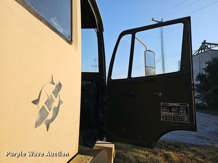 image for item DQ0334 1999 Stewart & Stevenson M 1079  truck cab and chassis