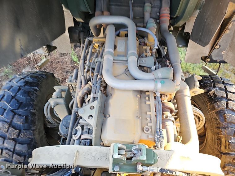 image for item DQ0334 1999 Stewart & Stevenson M 1079  truck cab and chassis