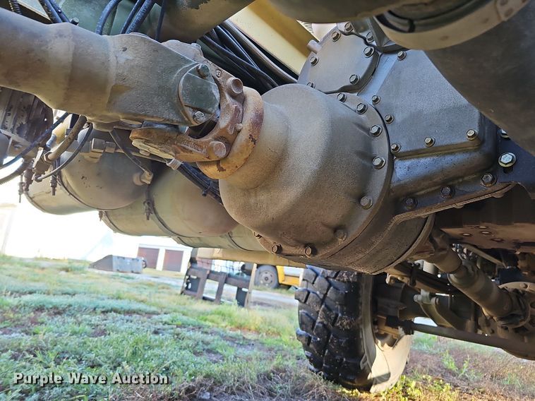 image for item DQ0334 1999 Stewart & Stevenson M 1079  truck cab and chassis