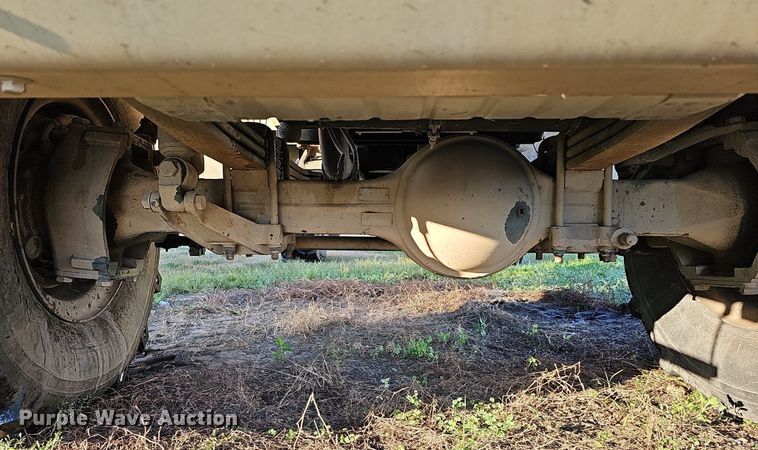 image for item DQ0334 1999 Stewart & Stevenson M 1079  truck cab and chassis