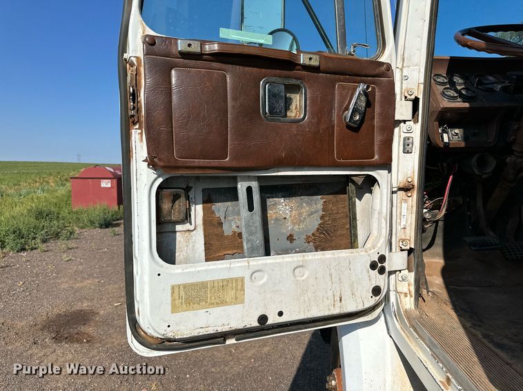 image for item KM9808 1989 White GMC WCS  dump truck