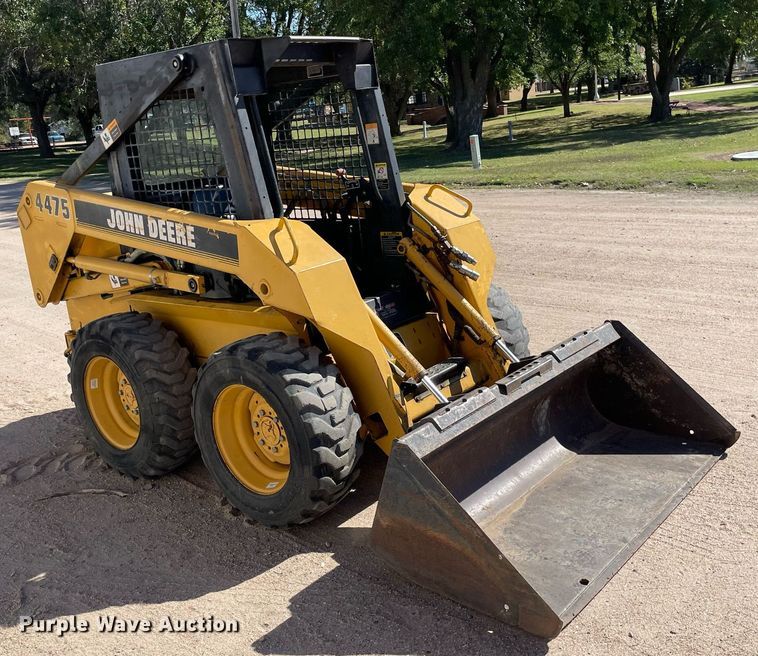 image for item NX9890 1995 John Deere 4475  skid steer loader