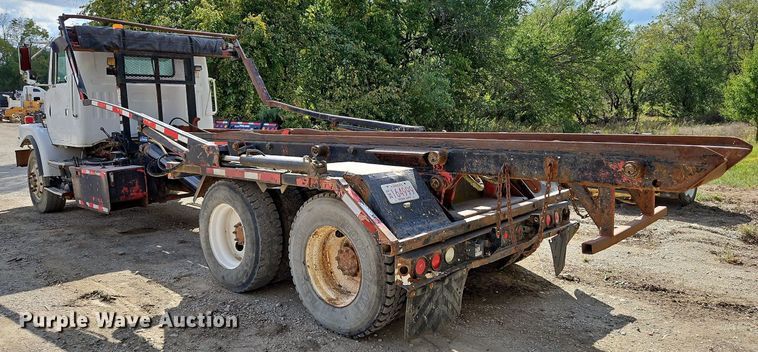 image for item DP2480 1999 Volvo WG64  roll-off container truck