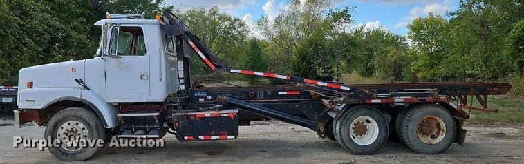 image for item DP2480 1999 Volvo WG64  roll-off container truck