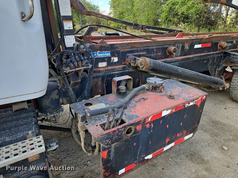 image for item DP2480 1999 Volvo WG64  roll-off container truck