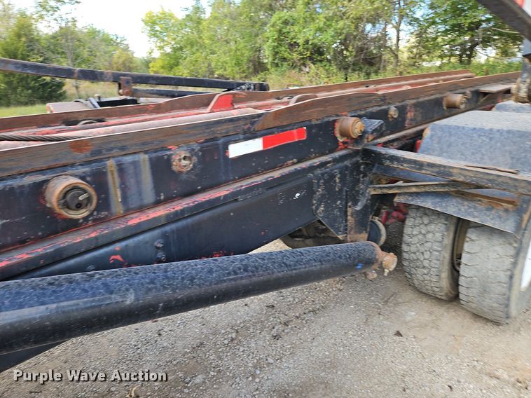 image for item DP2480 1999 Volvo WG64  roll-off container truck