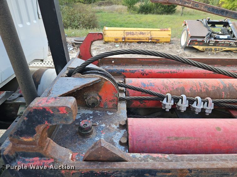 image for item DP2480 1999 Volvo WG64  roll-off container truck