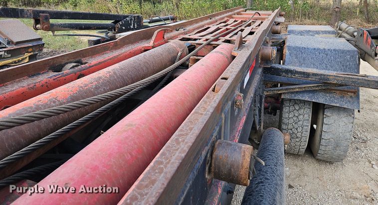 image for item DP2480 1999 Volvo WG64  roll-off container truck