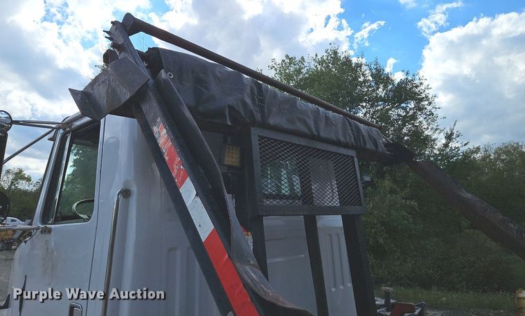 image for item DP2480 1999 Volvo WG64  roll-off container truck